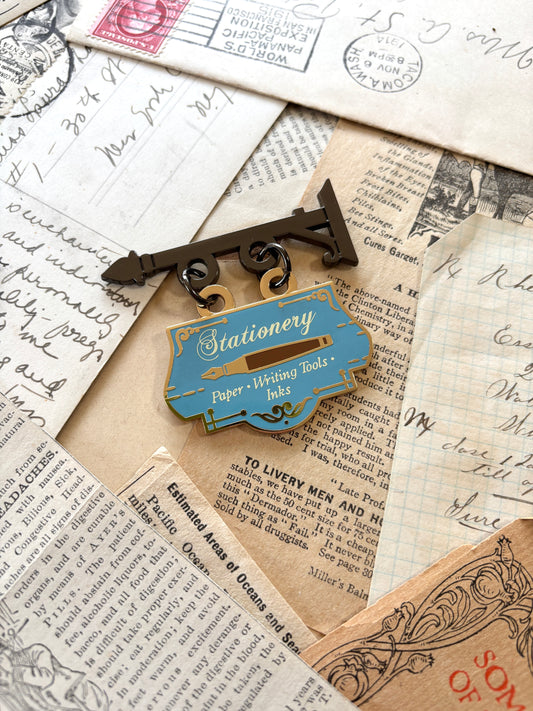Stationery store shop sign pin